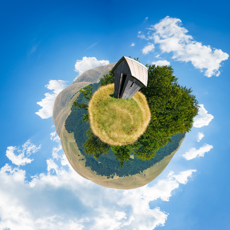 woodshed on little planet spherical panorama. beautiful countryside concept with 360 degree view....