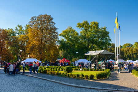Uzhgorod, Ukraine - SEP 28, 2018: Czech days in TransCarpathia festival. 100 year celebration of Czechoslovakia declaration in 1918. location Narodna Square. people taste dishes, beer and listen to national musicのeditorial素材