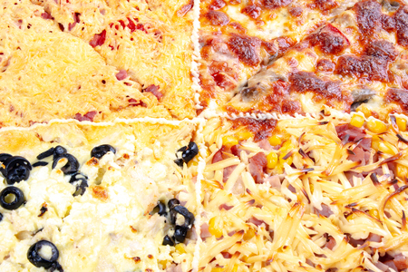 quadruple topping family pizza closeup. sausage vs pork and corn vs mushrooms vs olives, in different kind of cheese. find your favoriteの写真素材