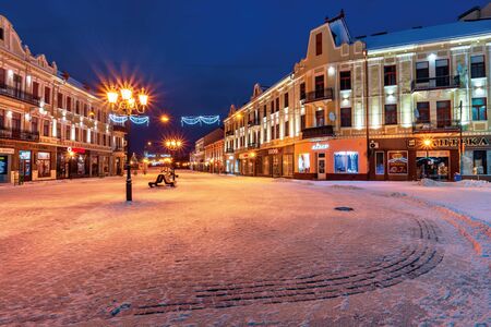 uzhhorod, ukraine - 06 JAN, 2019: christmas night scenery of uzhgorod. colorful glowing decorative illumination on petefi square. festive mood. happy holidaysのeditorial素材