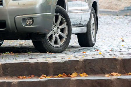 Uzhgorod, Ukraine - OCT 13, 2013: silver subaru forester suv on the pavement. autumn weather with...