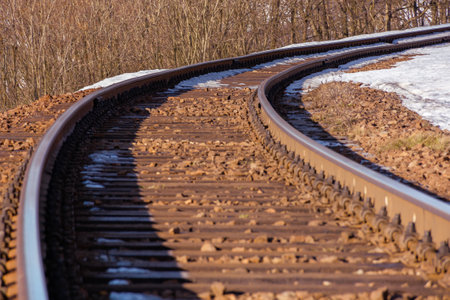 railroad in winter. snow on the roadside. transportation sceneryの写真素材