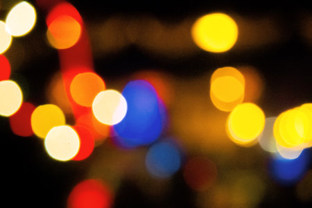 winter holidays background. garlands on the street with bokeh effect