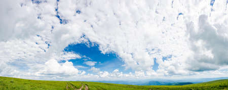 fluffy clouds on the blue sky in afternoon. beautiful nature background. panoramic view