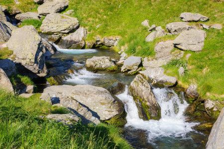 mountain river among the rocks on the hill. view from aboveの写真素材