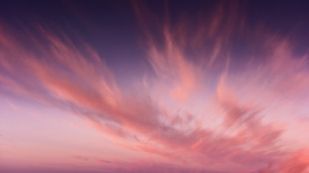 clouds on the sky at twilight. beautiful nature background in colorful light at dawnの写真素材