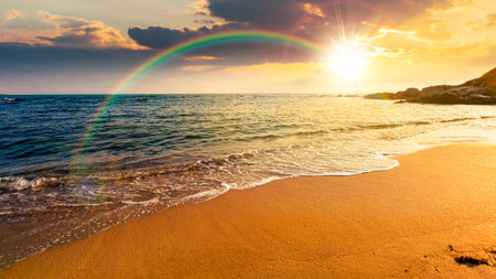 panoramic view of sand beach landscape at sunset. summer vacation season at the sea in evening...