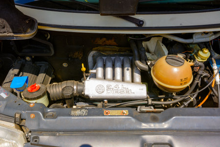 uzhhorod, ukraine - 4 jul 2019: volkswagen 2.4l diesel car engine bay close up. various components under open hood. powerful and high performance concept. background for maintenance and modificationのeditorial素材