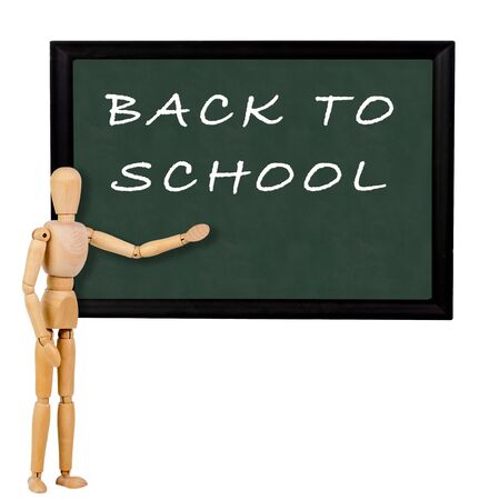 mannequin pointing to blackboard with the text "back to school"の写真素材