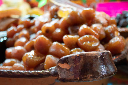 The sweet of tejocote is a typical Mexican food that is prepared in time of day of the dead and before the celebrationの写真素材