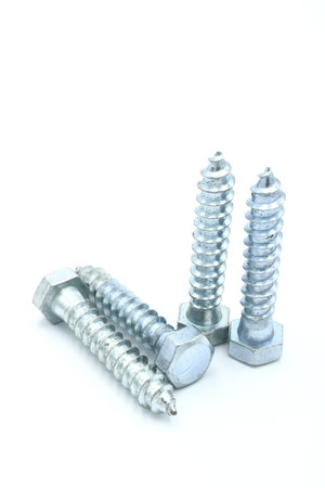 Dowel or wood screw, with hexagonal head on a white background