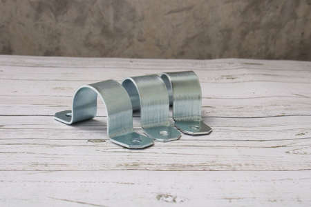 Omega clamp, used to hold tubular articles, or to support, it is held with a pair of screws since it...
