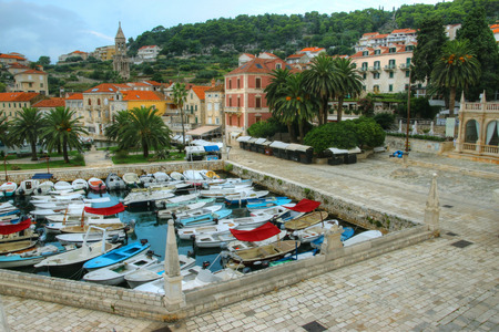 Historical Center of Coastal City with Harbouring Fishing Boats