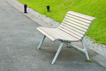 Empty wooden bench in the park