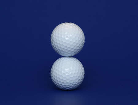 isolated standing golf ballの写真素材