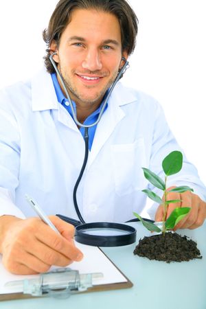 happy doctor writing report on testing subjectの写真素材