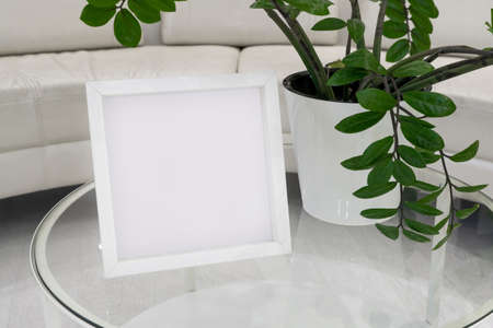 White frame in the interior. Mock-up for designers.