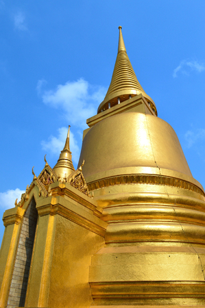 Golden Pagoda And Blue Sky In Temple Of Thailandの写真素材