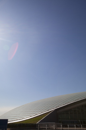 Exterior view of an airport under the clear blue sky
