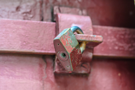 Closed padlock on the doorの写真素材