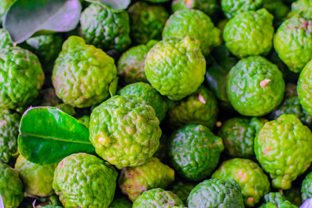 kaffir lime in plastic bag on table, selective focus point.の写真素材
