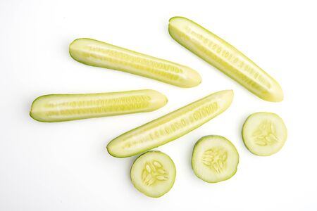 fresh juicy slice cucumber on a white background, isolatedの写真素材