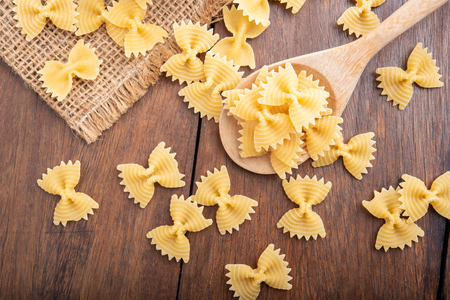 Pasta on wooden background, Diet and food concept.の写真素材