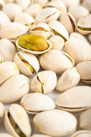 Pistachio nuts arranges as backgroundの写真素材