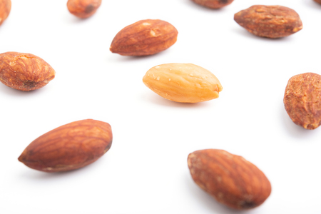 Almonds isolated on white backgroundの写真素材
