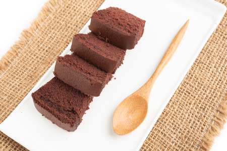 sliced bar cake chocolate slice slices in white background.の写真素材