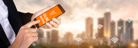 mobile business concept : businesswoman hands using smart phone for online shopping.