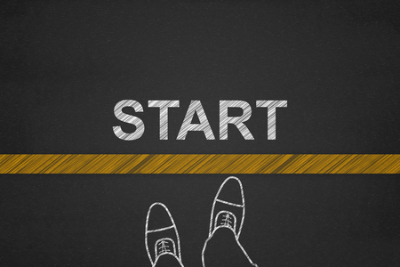 Start background, Top view of Businessman on Start line on a blackboard, Business Challenge or do something new.の写真素材