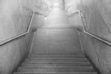Stairs of an access to an underground tunnel, detail of stairs for pedestrians.の写真素材