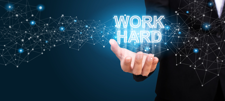 Work Hard in the hand of business. Work Hard concept.の写真素材