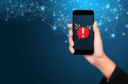 Concept of malware notification or error in mobile phone.の写真素材