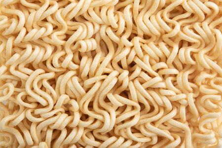 Detail of fast cooking noodles on white background.の写真素材