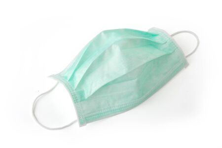 Hygienic mask or surgical earloop face mask isolated on whiteの写真素材