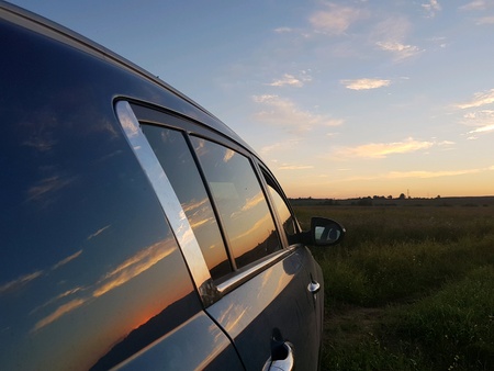 Sunset reflection on the carの素材