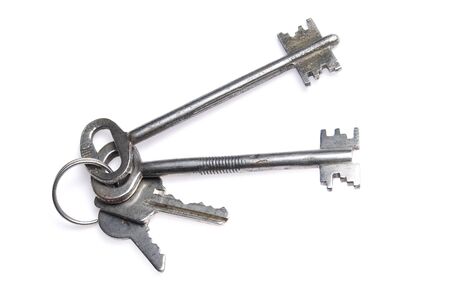 Bunch of keys, is isolated on a white backgroundの写真素材