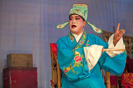 CHENGDU, CHINA-MARCH 12, 2011: Unnamed actor in the performance for theSichuan opera on March 12,...