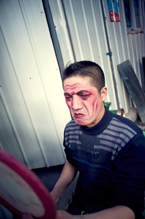 CHENGDU, CHINA-MARCH 12, 2011: Unidentified actor prepares backstage for the Sichuan opera on March 12, 2011, in Chengdu, China.  Sichuan opera is a Chinese folk tradition that originated in China around 1700.のeditorial素材