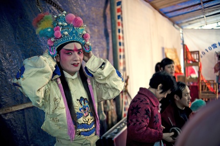 CHENGDU, CHINA-MARCH 12, 2011: Unidentified actor prepares backstage for the Sichuan opera on March 12, 2011, in Chengdu, China.  Sichuan opera is a Chinese folk tradition that originated in China around 1700.のeditorial素材