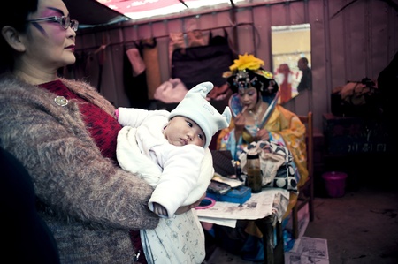 CHENGDU, CHINA-MARCH 12, 2011: Unidentified actor prepares backstage for the Sichuan opera on March 12, 2011, in Chengdu, China.  Sichuan opera is a Chinese folk tradition that originated in China around 1700.のeditorial素材
