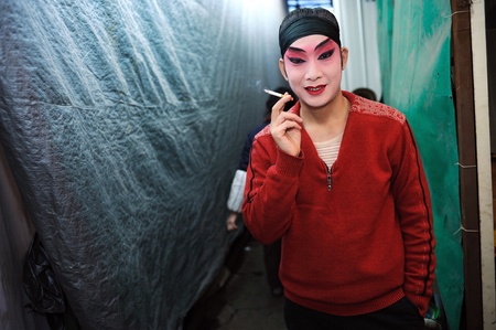 CHENGDU, CHINA-DECEMBER 11, 2011: Unidentified actor prepares backstage for the Sichuan opera on DECEMBER 11, 2011, in Chengdu, China.  Sichuan opera is a Chinese folk tradition that originated in China around 1700.のeditorial素材