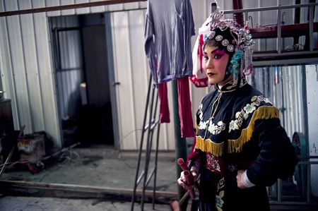 CHENGDU, CHINA-MARCH 12, 2011: Unidentified actor prepares backstage for the Sichuan opera on March 12, 2011, in Chengdu, China.  Sichuan opera is a Chinese folk tradition that originated in China around 1700.のeditorial素材