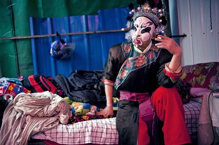 CHENGDU, CHINA-MARCH 12, 2011: Unidentified actor prepares backstage for the Sichuan opera on March 12, 2011, in Chengdu, China.  Sichuan opera is a Chinese folk tradition that originated in China around 1700.のeditorial素材
