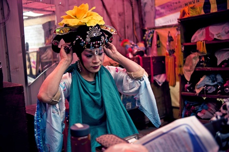 CHENGDU, CHINA-MARCH 12, 2011: Unidentified actor prepares backstage for the Sichuan opera on March 12, 2011, in Chengdu, China.  Sichuan opera is a Chinese folk tradition that originated in China around 1700.のeditorial素材