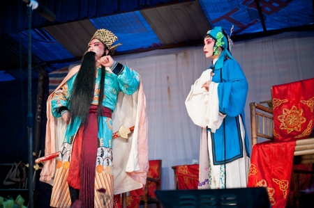 CHENGDU, CHINA-MARCH 12: unknown actors in the performing for the Sichuan opera on March 12, 2011,  Chengdu, it is a Chinese folk tradition that originated in China around 1700.のeditorial素材