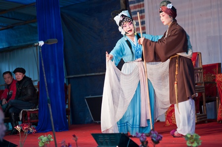 CHENGDU, CHINA-MARCH 12: unknown actors in the performing for the Sichuan opera on March 12, 2011,  Chengdu, it is a Chinese folk tradition that originated in China around 1700.のeditorial素材