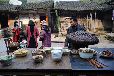 Sichuan Province, China 2 February: Sichuan rural areas, Chinese New Year, a woman who declined to be named, is preparing food for the family, reunion dinner, Sichuan, China, February 2, 2011のeditorial素材